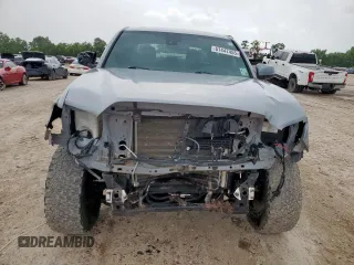 2019 Toyota Tacoma SR z VIN 3TMCZ5AN5KM244592, wystawiony jako Copart lot #61447455 z przebiegiem 78 795 mil mil oraz Szkoda całkowita • Salvage title. Historia ofert i sprzedaży dostępna na DreamBid. Obrazek 5.
