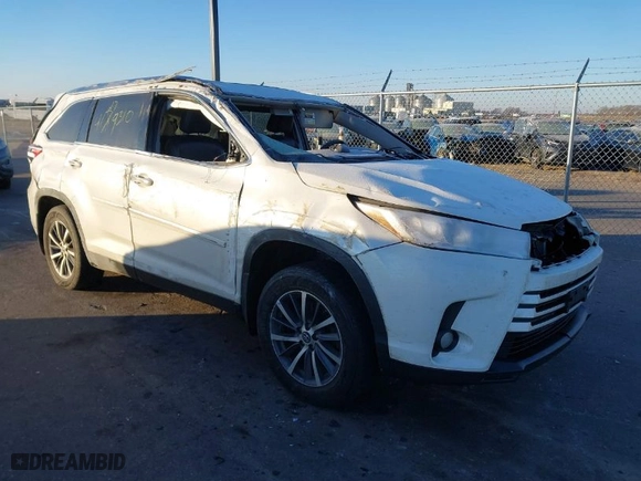 2019 Toyota Highlander SE with VIN 5TDJZRFH2KS566656, listed as a IAAI auction lot 41279310 with 103,172 mi miles. Bid and sale history available at carsss.com. Image 1.