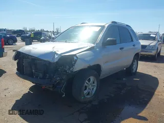 2006 Kia Sportage LX with VIN KNDJE723467202880, listed as a IAAI auction lot 41828141 with 263,068 mi miles and . Bid and sale history available at DreamBid. Image 2.