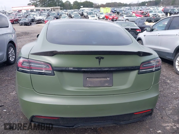 2022 Tesla Model S with VIN 5YJSA1E50NF487306, listed as a IAAI auction lot 41570528 with Not Provided miles and . Bid and sale history available at DreamBid. Image 17.