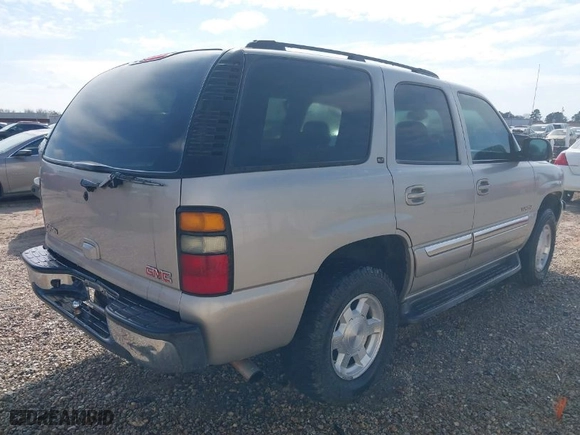 2005 GMC Yukon SLT with VIN 1GKEC13T05R127797, listed as a IAAI auction lot 41540673 with 241,617 mi miles. Bid and sale history available at carsss.com. Image 4.