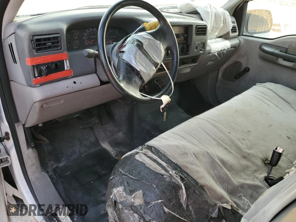 2000 Ford Super Duty F-250 XL with VIN 1FTNF21F7YEA97991, listed as a Copart auction lot 54577544 with 82,036 mi miles and Salvage Title. Bid and sale history available at carsss.com. Image 8.