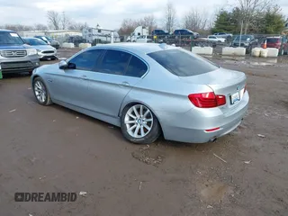 2014 BMW 5 Series 535i xDrive with VIN WBA5B3C52ED537121, listed as a IAAI auction lot 41678763 with 126,979 mi miles and . Bid and sale history available at carsss.com. Image 3.
