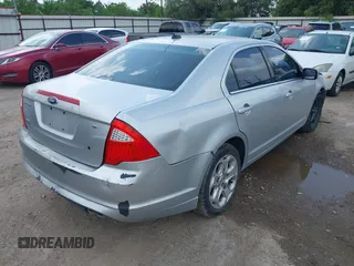 2011 Ford Fusion SE with VIN 3FAHP0HA0BR305471, listed as a IAAI auction lot 42099320 with 175,089 mi miles. Bid and sale history available at carsss.com. Image 4.