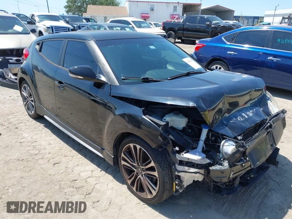 2016 Hyundai Veloster Turbo with VIN KMHTC6AE5GU281597, listed as a IAAI auction lot 42006038 with 77,642 mi miles. Bid and sale history available at carsss.com. Image 1.
