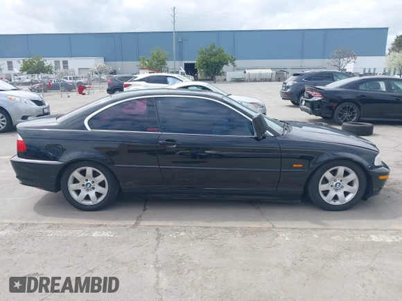 2002 BMW 3 Series 325Ci with VIN WBABN33482JW53230, listed as a IAAI auction lot 41912031 with 211,631 mi miles. Bid and sale history available at carsss.com. Image 13.