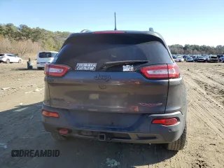 2018 Jeep Cherokee Trailhawk with VIN 1C4PJMBB9JD548008, listed as a Copart auction lot 43076075 with 61,906 mi miles and Salvage title. Bid and sale history available at DreamBid. Image 6.