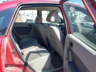 2009 Ford Focus S with VIN 1FAHP34N69W102568, listed as a IAAI auction lot 42137185 with 113,099 mi miles. Bid and sale history available at carsss.com. Image 8.