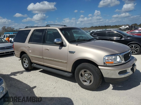 1997 Ford Expedition XLT with VIN 1FMEU17L7VLB84516, listed as a Copart auction lot 76664984 with 269,040 mi miles and Salvage title. Bid and sale history available at DreamBid. Image 4.