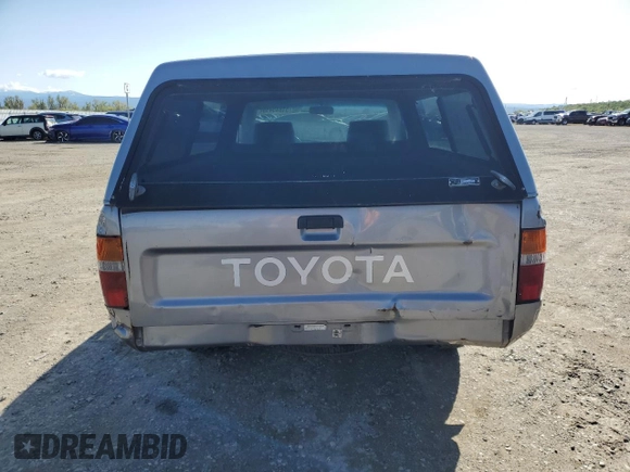 1993 Toyota Pickup z VIN 4TARN81AXPZ113969, wystawiony jako Copart lot #51845495 z przebiegiem 278 277 mil mil oraz Czysty tytuł • Clean title. Historia ofert i sprzedaży dostępna na DreamBid. Obrazek 6.