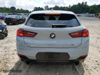 2021 BMW X2 xDrive28i with VIN WBXYJ1C04M5S67817, listed as a Copart auction lot 68214304 with 54,454 mi miles and Salvage Title. Bid and sale history available at carsss.com. Image 6.
