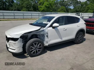2018 Mazda CX-5 Touring z VIN JM3KFACM0J1462783, wystawiony jako Copart lot #57178405 z przebiegiem 75 684 mil mil oraz Szkoda całkowita • Salvage title. Historia ofert i sprzedaży dostępna na DreamBid. Obrazek 1.