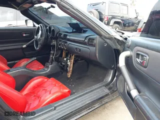 2001 Toyota MR2 Spyder with VIN JTDFR320710035330, listed as a IAAI auction lot 41238516 with 160,405 mi miles. Bid and sale history available at carsss.com. Image 5.