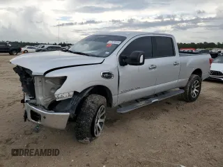 2018 Nissan Titan XD SV with VIN 1N6AA1F47JN513894, listed as a Copart auction lot 77979914 with 209,717 mi miles and Salvage Title. Bid and sale history available at carsss.com. Image 1.