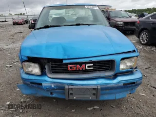 1994 GMC Sonoma z VIN 1GTCS1444R8527872, wystawiony jako Copart lot #55327395 z przebiegiem 229 801 mil mil oraz Szkody całkowita. Historia ofert i sprzedaży dostępna na DreamBid. Obrazek 5.