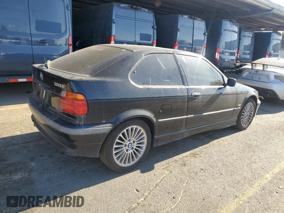 1997 BMW 3 Series 318tiA with VIN WBACG8326VAU38752, listed as a Copart auction lot 79974764 with 169,444 mi miles and Clean Title. Bid and sale history available at carsss.com. Image 3.