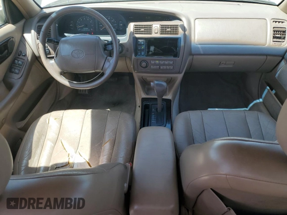 1997 Toyota Avalon XL with VIN 4T1BF12B0VU187179, listed as a Copart auction lot 54708565 with 336,922 mi miles and Salvage Title. Bid and sale history available at DreamBid. Image 8.