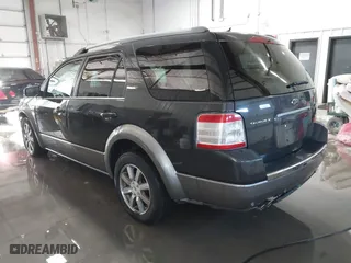2008 Ford Taurus X SEL with VIN 1FMDK02W98GA15575, listed as a IAAI auction lot 41328842 with 245,307 mi miles. Bid and sale history available at carsss.com. Image 3.
