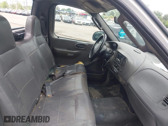 2004 Ford F-150 XL with VIN 2FTRF17W84CA35714, listed as a IAAI auction lot 42610810 with 129,865 mi miles and . Bid and sale history available at DreamBid. Image 5.