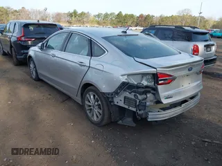2019 Ford Fusion Titanium with VIN 3FA6P0SU8KR212370, listed as a IAAI auction lot 42114934 with 42,521 mi miles and . Bid and sale history available at DreamBid. Image 3.