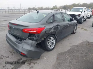 2017 Ford Focus SE with VIN 1FADP3F22HL299398, listed as a IAAI auction lot 41162384 with 121,993 mi miles and . Bid and sale history available at DreamBid. Image 4.