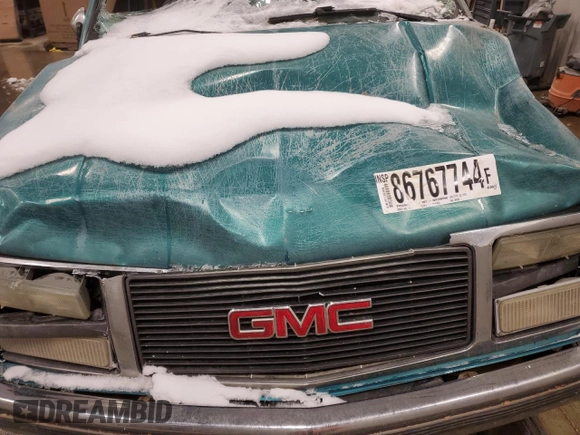 1993 GMC Sierra 1500 z VIN 2GTEK19K8P1562964, wystawiony jako Copart lot #86767744 z przebiegiem 237 615 mil mil oraz Czysty tytuł • Clean title. Historia ofert i sprzedaży dostępna na DreamBid. Obrazek 12.