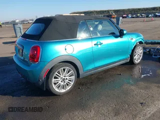 2016 MINI Convertible z VIN WMWWG5C50G3C19656, wystawiony jako IAAI lot #41429611 z przebiegiem 60 873 mil mil oraz . Historia ofert i sprzedaży dostępna na DreamBid. Obrazek 4.