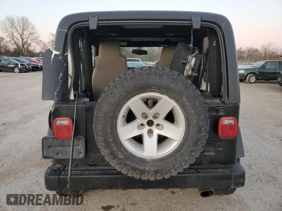 2005 Jeep Wrangler Rubicon with VIN 1J4FA69S55P317666, listed as a Copart auction lot 81782754 with 119,954 mi miles and Salvage Title. Bid and sale history available at carsss.com. Image 6.