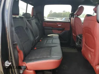 2019 Ram 1500 Rebel z VIN 1C6SRFLT8KN618140, wystawiony jako Copart lot #54734815 z przebiegiem 145 040 mil mil oraz Szkoda całkowita • Salvage title. Historia ofert i sprzedaży dostępna na DreamBid. Obrazek 10.