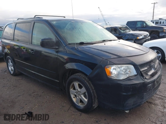 2012 Dodge Grand Caravan SXT with VIN 2C4RDGCG3CR318900, listed as a IAAI auction lot 41145958 with 201,117 mi miles and . Bid and sale history available at DreamBid. Image 1.