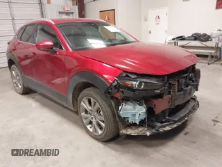 2021 Mazda CX-30 Premium with VIN 3MVDMADL8MM320149, listed as a IAAI auction lot 41317680 with 47,383 mi miles and . Bid and sale history available at DreamBid. Image 1.