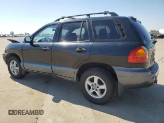 2001 Hyundai Santa Fe GLS with VIN KM8SC83D71U123474, listed as a Copart auction lot 50665145 with 84,155 mi miles and Salvage Title. Bid and sale history available at carsss.com. Image 2.