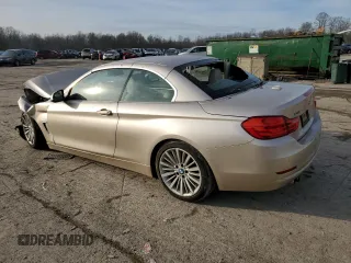 2015 BMW 4 Series 428i xDrive with VIN WBA3T1C53FP821169, listed as a Copart auction lot 86566414 with Not Provided miles and Salvage Title. Bid and sale history available at carsss.com. Image 2.
