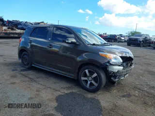 2011 Scion xD with VIN JTKKU4B46B1008873, listed as a IAAI auction lot 41871913 with 145,722 mi miles. Bid and sale history available at carsss.com. Image 1.