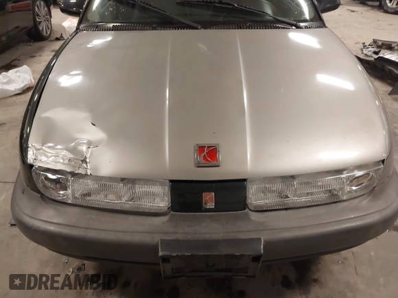 1997 Saturn SL with VIN 1G8ZH5280VZ172929, listed as a IAAI auction lot 41273214 with 134,972 mi miles. Bid and sale history available at carsss.com. Image 18.
