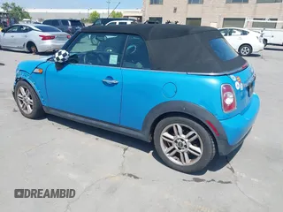 2014 MINI Convertible с VIN WMWZN3C55ET569656, выставлен на аукционе IAAI как лот 42105348 с пробегом 87 671 миль миль и . История ставок и продаж доступна на DreamBid. Изображение 3.