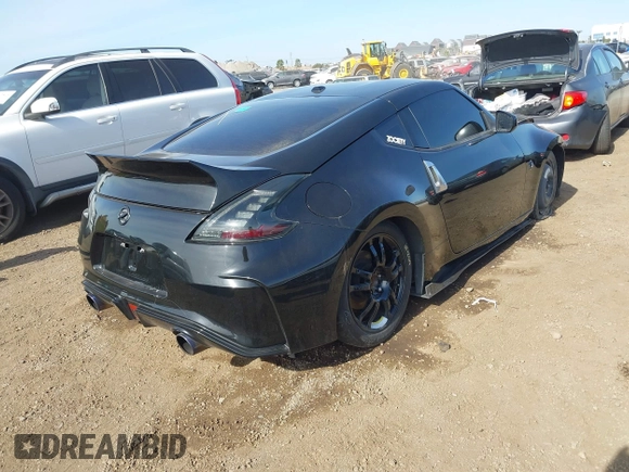 2009 Nissan 370Z Touring with VIN JN1AZ44E39M408668, listed as a IAAI auction lot 41231840 with 93,826 mi miles and . Bid and sale history available at DreamBid. Image 4.