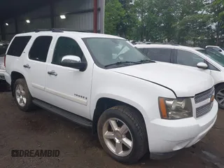 2008 Chevrolet Tahoe 2LT with VIN 1GNFK13048R102051, listed as a IAAI auction lot 42632061 with 264,159 mi miles and . Bid and sale history available at DreamBid. Image 1.