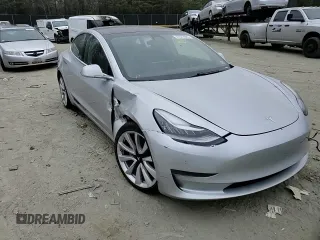 2018 Tesla Model 3 Long Range Battery with VIN 5YJ3E1EA8JF060682, listed as a Copart auction lot 47072985 with Not Provided miles and Salvage Title. Bid and sale history available at DreamBid. Image 10.