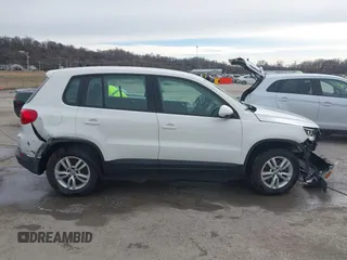 2013 Volkswagen Tiguan S z VIN WVGAV3AX6DW610678, wystawiony jako IAAI lot #41544865 z przebiegiem 102 948 mil mil oraz . Historia ofert i sprzedaży dostępna na DreamBid. Obrazek 13.