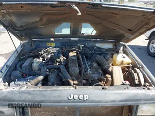 1995 Jeep Cherokee Sport with VIN 1J4FJ68S5SL541413, listed as a IAAI auction lot 42722408 with 335,432 mi miles and . Bid and sale history available at DreamBid. Image 10.