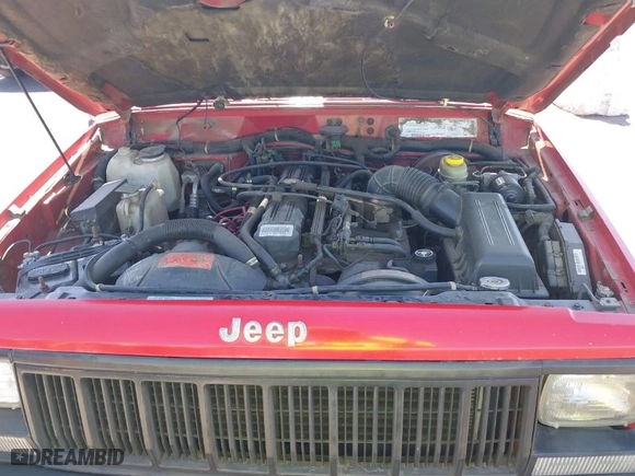 1995 Jeep Cherokee Sport with VIN 1J4FJ68SXSL572608, listed as a IAAI auction lot 42023846 with 167,342 mi miles. Bid and sale history available at carsss.com. Image 10.