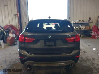 2016 BMW X1 xDrive28i with VIN WBXHT3C3XGP885359, listed as a IAAI auction lot 41743616 with 44,436 mi miles. Bid and sale history available at carsss.com. Image 16.