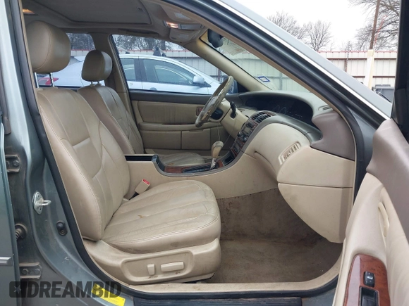 2002 Toyota Avalon XL with VIN 4T1BF28BX2U262186, listed as a IAAI auction lot 41572610 with 164,899 mi miles and . Bid and sale history available at DreamBid. Image 5.