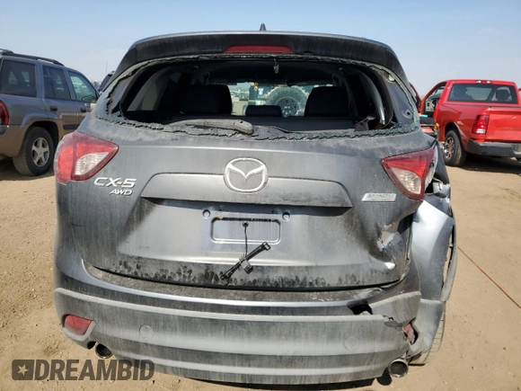 2014 Mazda CX-5 Sport z VIN JM3KE4BE1E0359446, wystawiony jako Copart lot #54562545 z przebiegiem 128 150 mil mil oraz Szkoda całkowita • Salvage title. Historia ofert i sprzedaży dostępna na DreamBid. Obrazek 6.