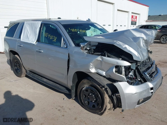 2018 Chevrolet Tahoe Commercial with VIN 1GNSKDEC1JR340887, listed as a IAAI auction lot 41044038 with 99,500 mi miles. Bid and sale history available at carsss.com. Image 1.