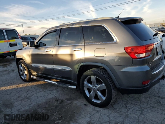 2011 Jeep Grand Cherokee Overland with VIN 1J4RS6GGXBC601757, listed as a Copart auction lot 82770454 with 132,109 mi miles and Salvage Title. Bid and sale history available at DreamBid. Image 2.
