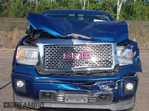 2015 GMC Sierra 1500 Denali z VIN 3GTP1WEC2FG201307, wystawiony jako IAAI lot #41931366 z przebiegiem 99 644 mil mil oraz . Historia ofert i sprzedaży dostępna na DreamBid. Obrazek 11.