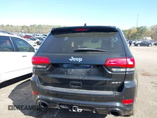 2017 Jeep Grand Cherokee SRT with VIN 1C4RJFDJ2HC696025, listed as a IAAI auction lot 41863274 with 126,949 mi miles. Bid and sale history available at carsss.com. Image 16.