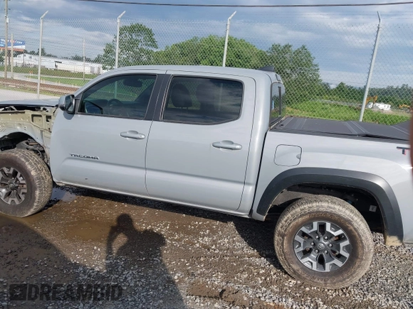 2021 Toyota Tacoma SR with VIN 5TFCZ5AN7MX255512, listed as a IAAI auction lot 42497907 with 50,563 mi miles and . Bid and sale history available at DreamBid. Image 15.